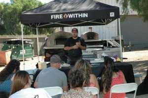 Vito Romani, sharing his journey with the crowd before serving them his superb pizzas.