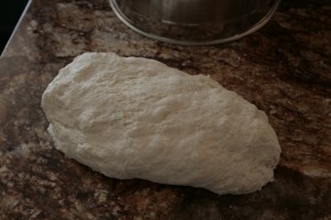 The dough will look coarse at first but will smooth out when you form it into a ball