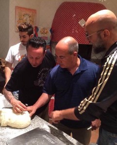 Giulio Adriani, right, working with Tony G. and John A. to develop a new blend of pizza flour