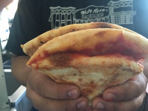 With Naples street pizzas you fold it up to eat it.