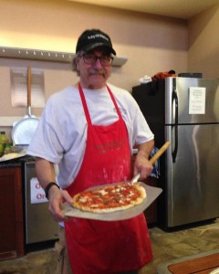 A man and his pizza!