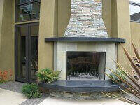 Calore Outdoor Fireplace Tile and Rock Finish