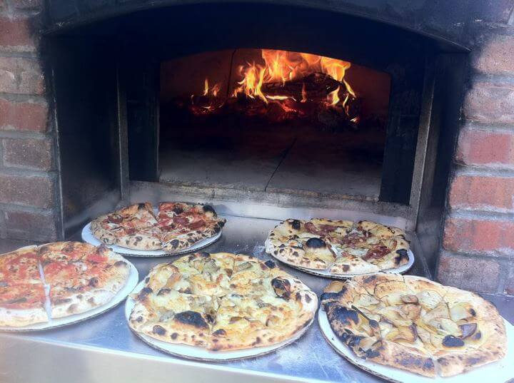 5 pizzas on oven hearth