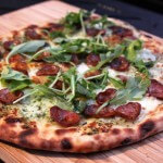 andouille sausage and pesto pizza