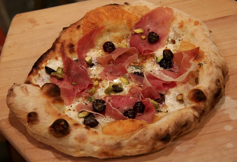 Prosciutto and Concord Grape pizza Forno Bravo. Authentic Wood Fired