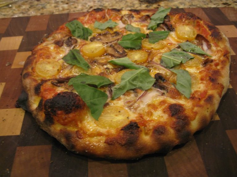 Pizza With Roasted Mushrooms, Cherry Tomatoes, Red Onion and Basil