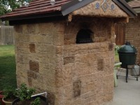 Casa pizza oven with stone veneer slate roof and extended throat