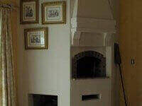 Casa Home Pizza Oven Corner Design Indoors with Stucco Finish