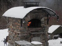 outdoor pizza oven winter snow