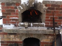 Pompeii diy brick oven with brick exterior in winter