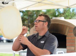 Man Throwing Pizza Dough