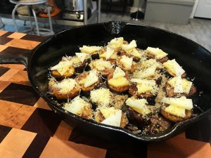 Figs in cast iron pan covered with cheese