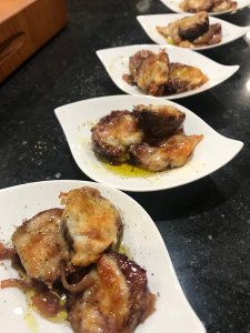 Fire Roasted Figs and Spanish Cheese in fluted square plates