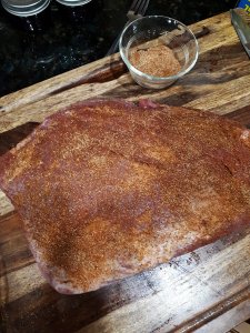 brisket with dry-rub spices applied