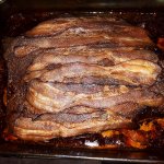 Beef brisket with strips of bacon