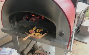 Peaches on grill pan in a Bella Pizza Oven