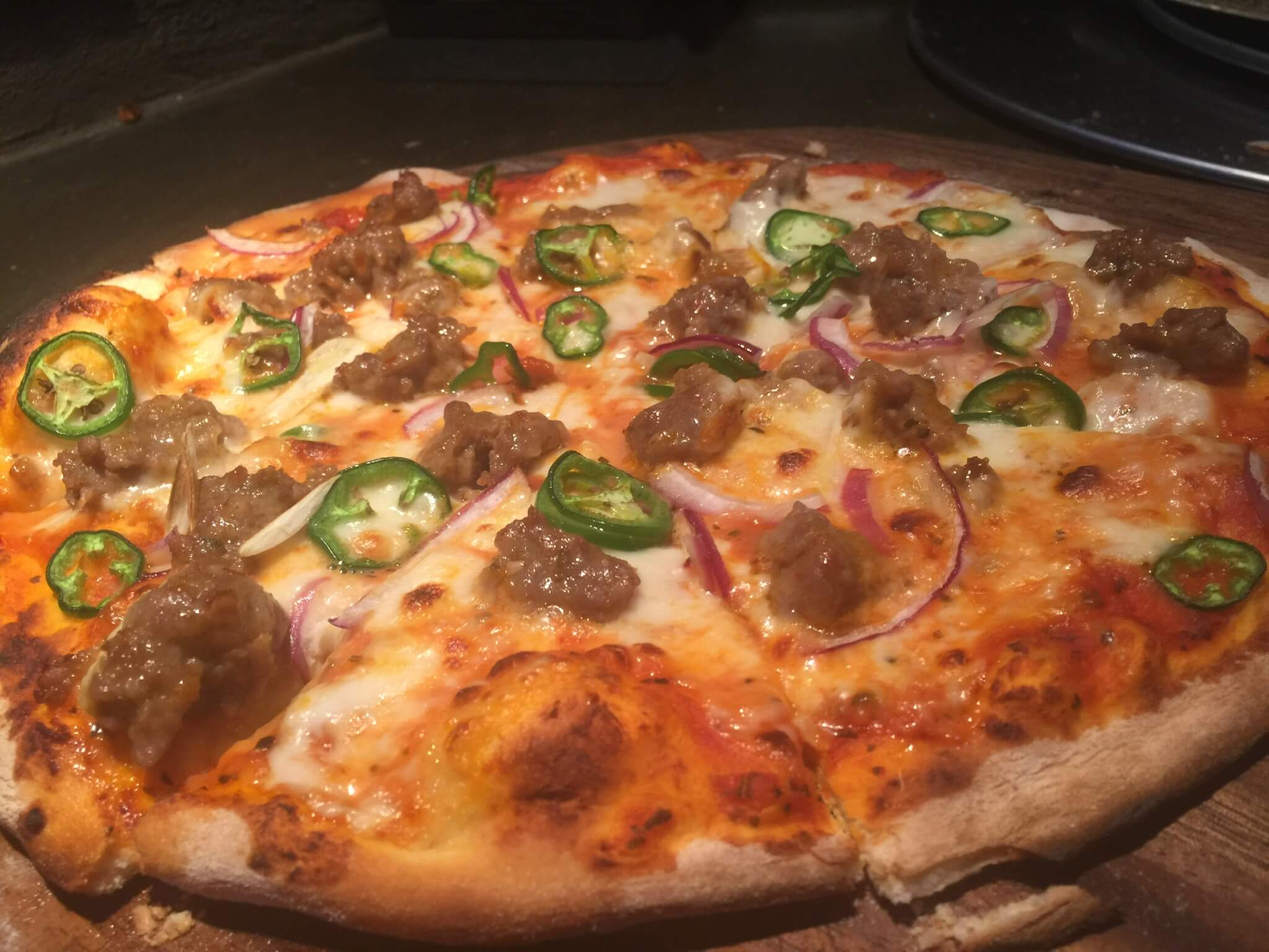 nucasacustomersmoked beef brisket with onion and jalapenos pizza