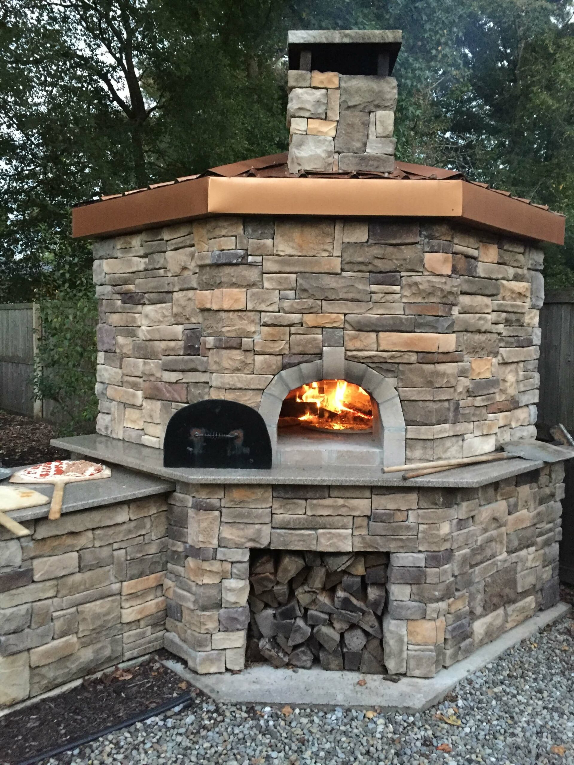 nupompeiicustomer06_finished stone oven with fire and pizza_2019