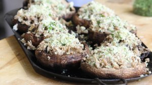 Tray of uncooked stuffed mushrooms