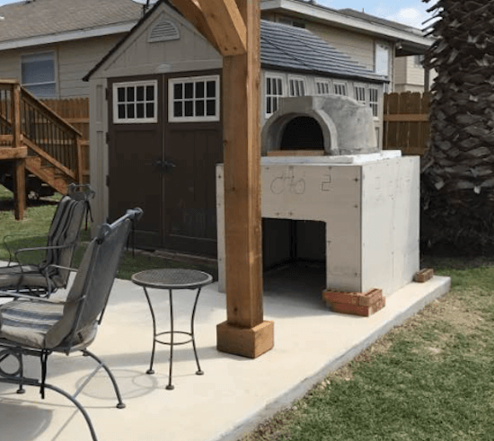 Pizza oven on unfinished base -back yard