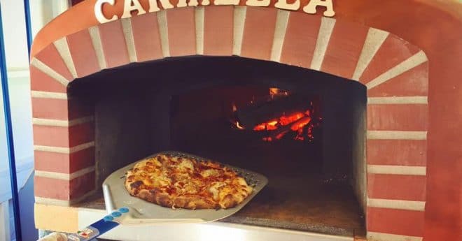 Red Roma Wood Fired Oven with Pizza