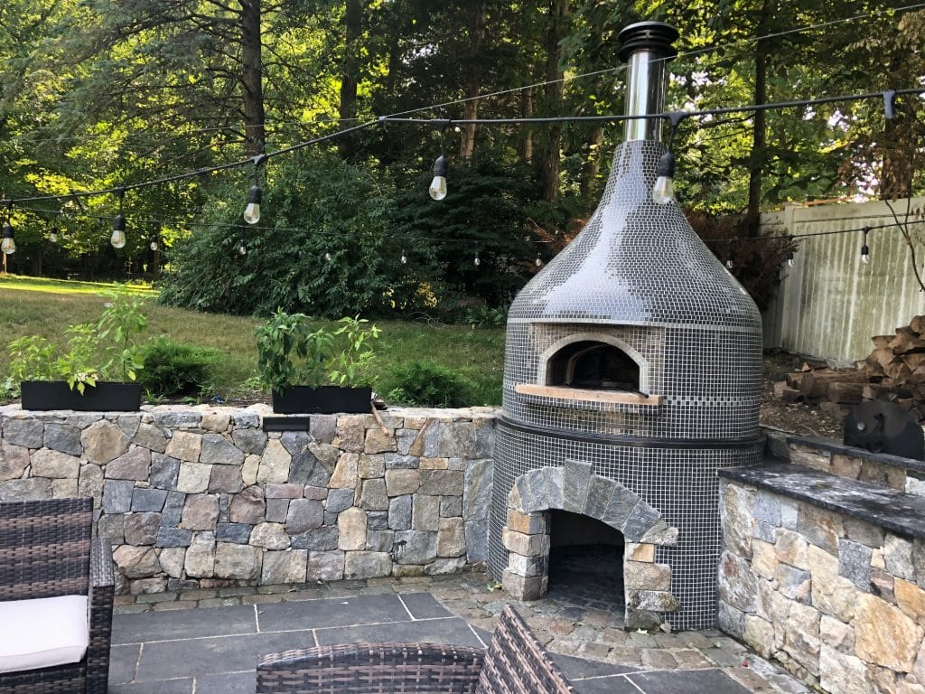 grey tiled volcano style pizza oven