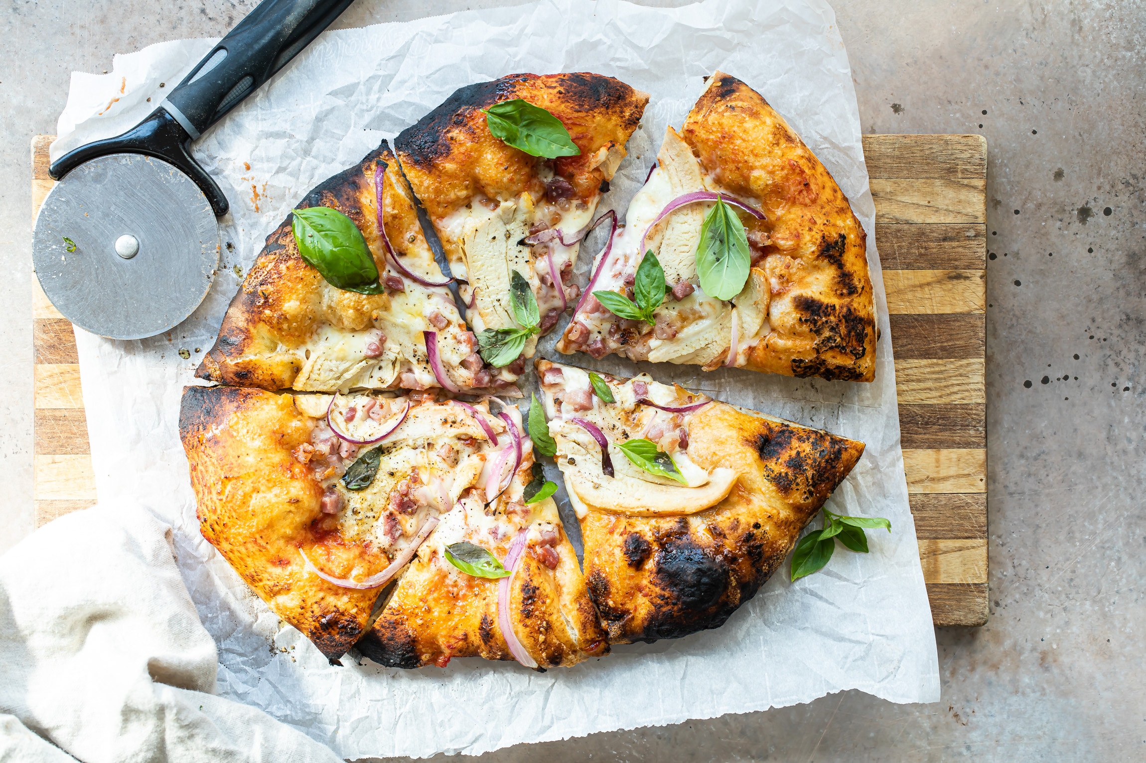 Chicken Pancetta Pizza with Cutter Forno Bravo. Authentic Wood Fired