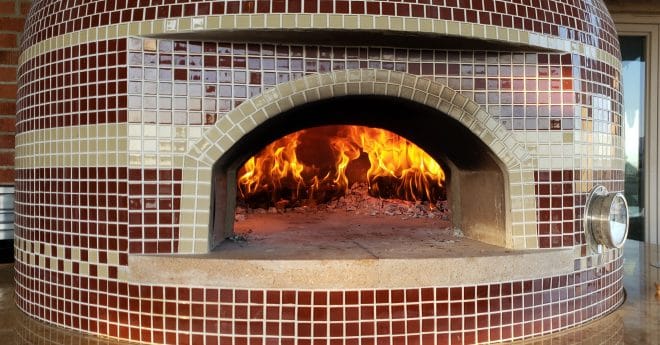 tiled pizza oven with fire