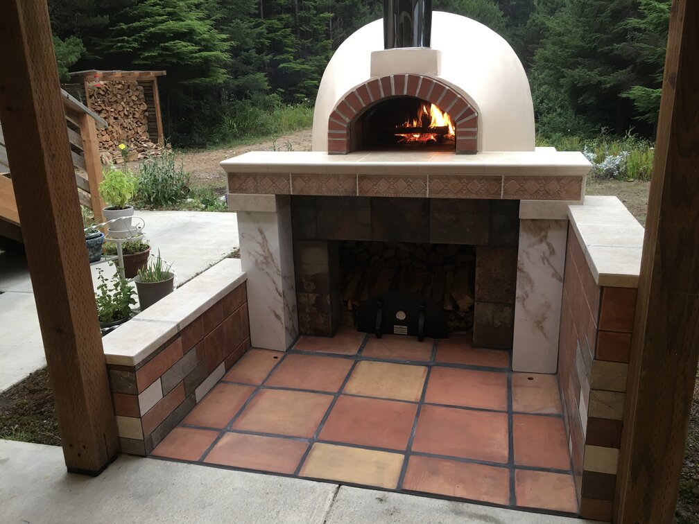 white pizza oven with fire