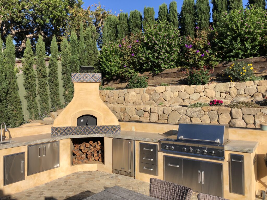 Yellow stucco oven-outdoor kitchen-terraces