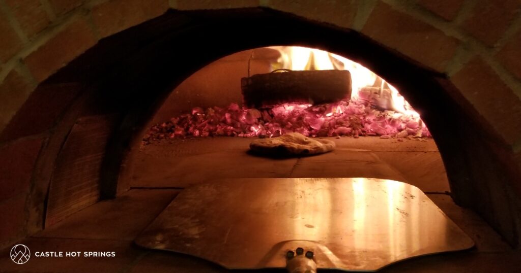 pizza oven interior-coals-pizza-peel