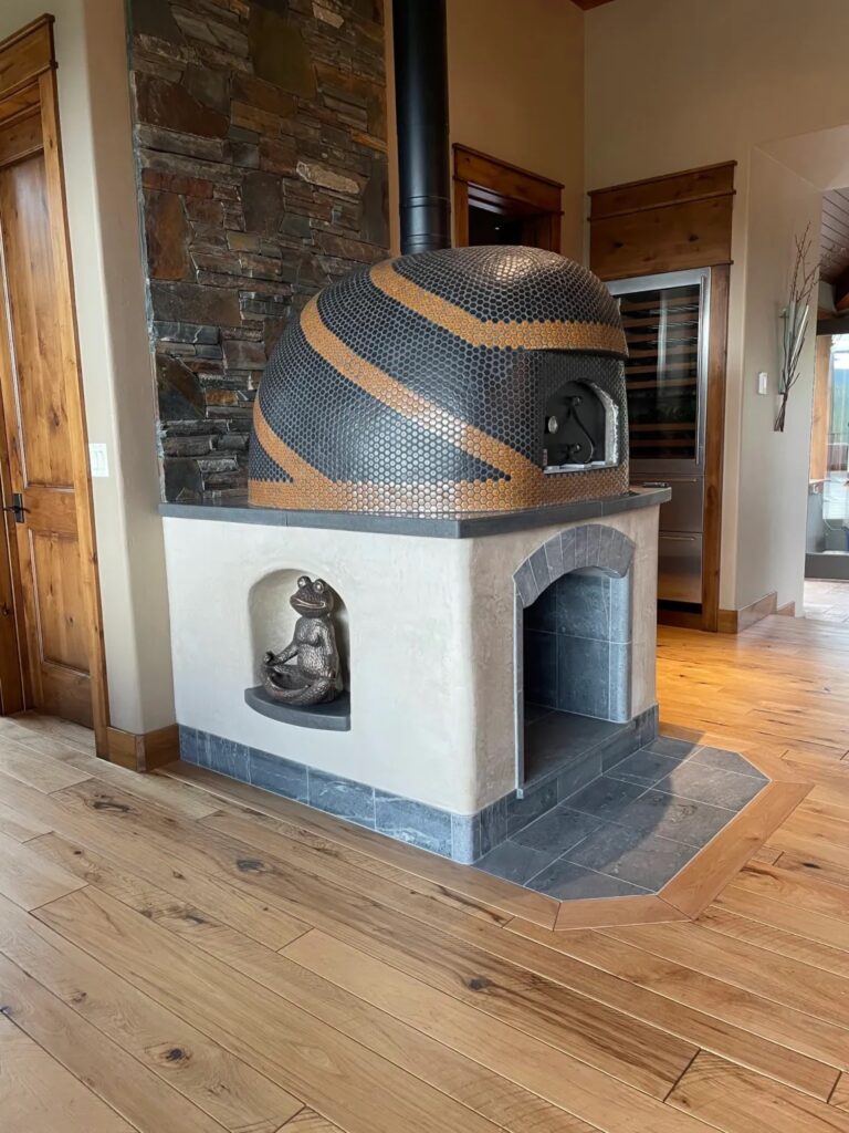 Left side view of tiled wood fired oven-dome shape