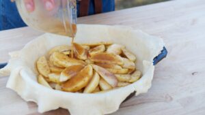 Apple Crostada-pouring spice sauce