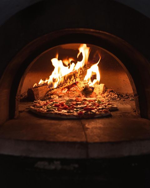 Pizza in Oven-Fire