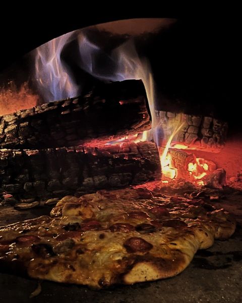 Pizza in Oven-Fire