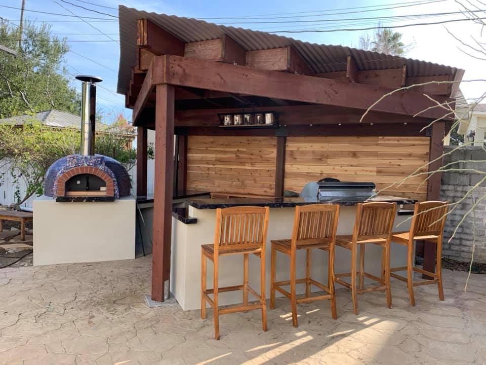 pizza oven by cover patio