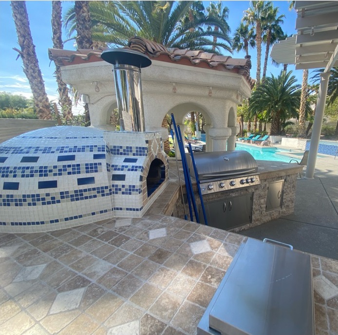 pizza oven with white and blue tile-left side