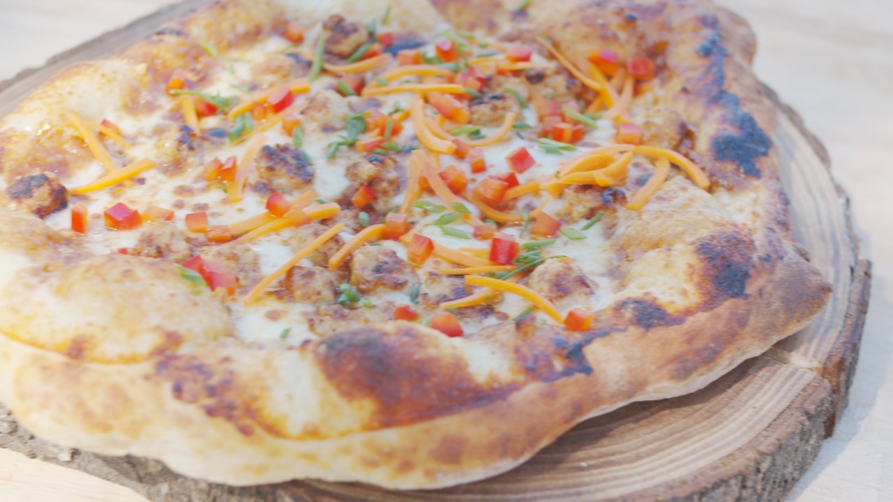 pizza on wood block