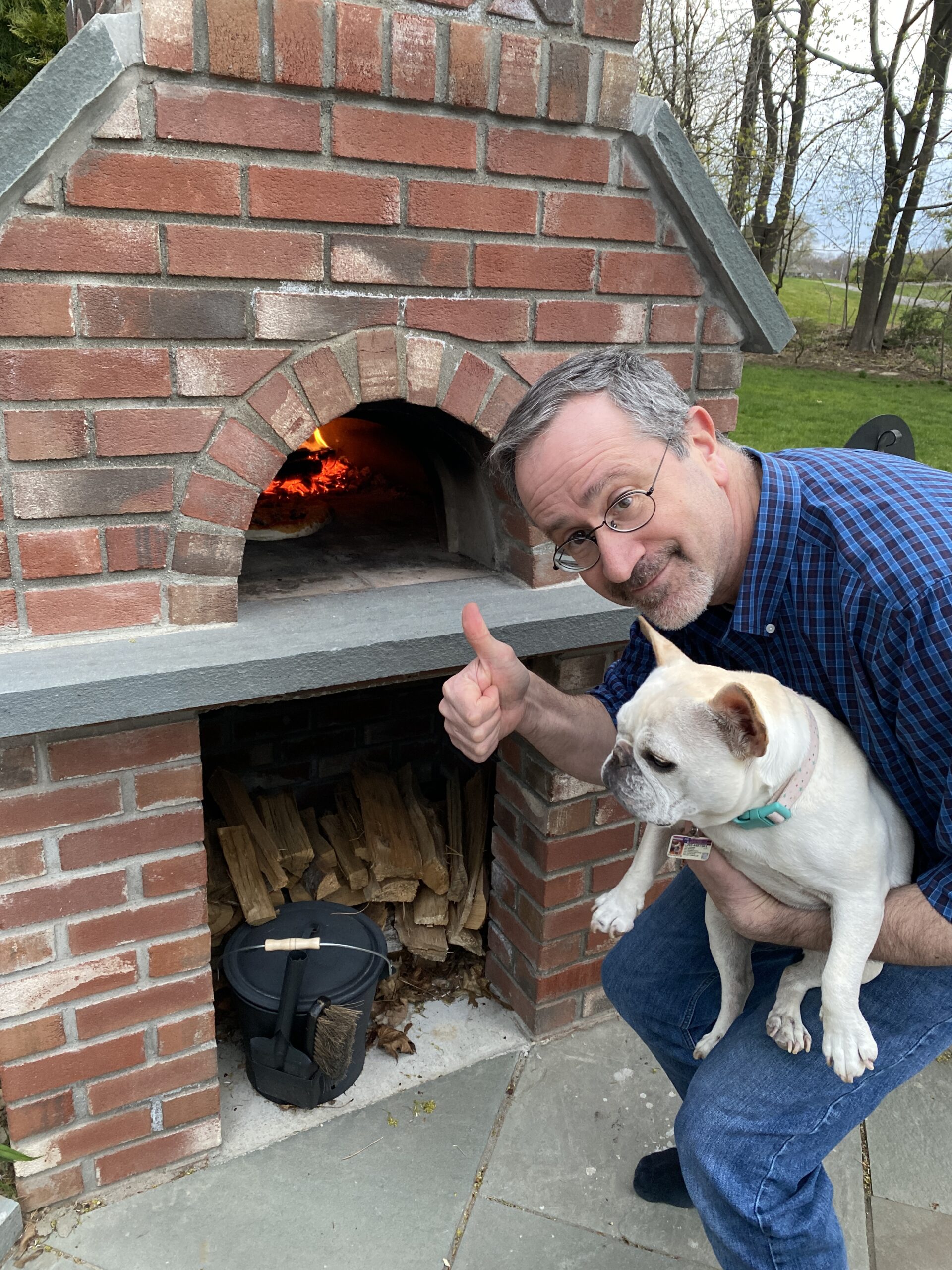 brick pizza oven-man-dog