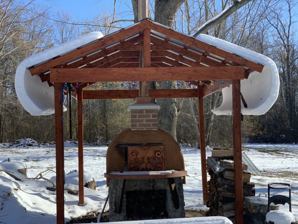 oven under cover-snow drifts off roof