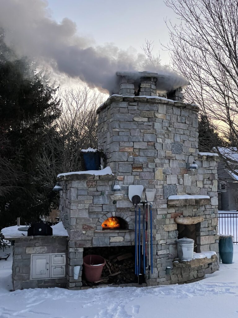 Stone pizza oven with fire